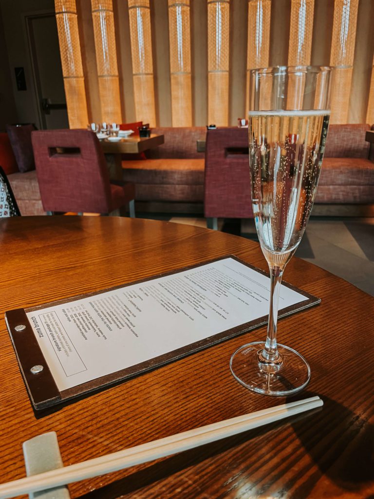 A glass of champagne at zuma in the four seasons boston